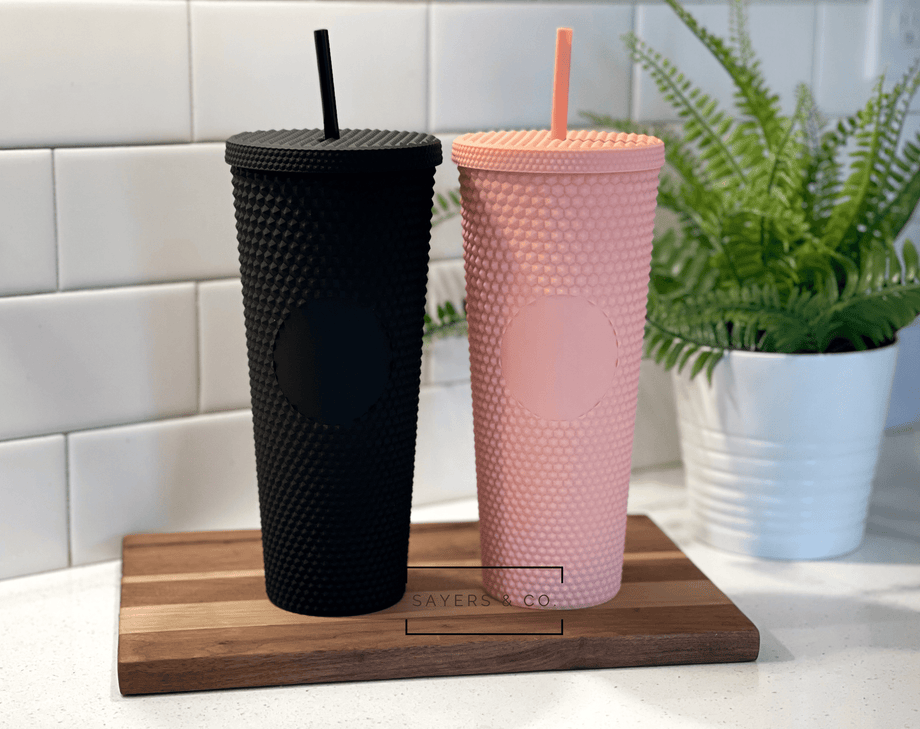 https://www.sayersandco.com/cdn/shop/products/24oz-Matte-Glossy-Studded-Double-Walled-Tumbler-Pink-Black_460x@2x.png?v=1691975049