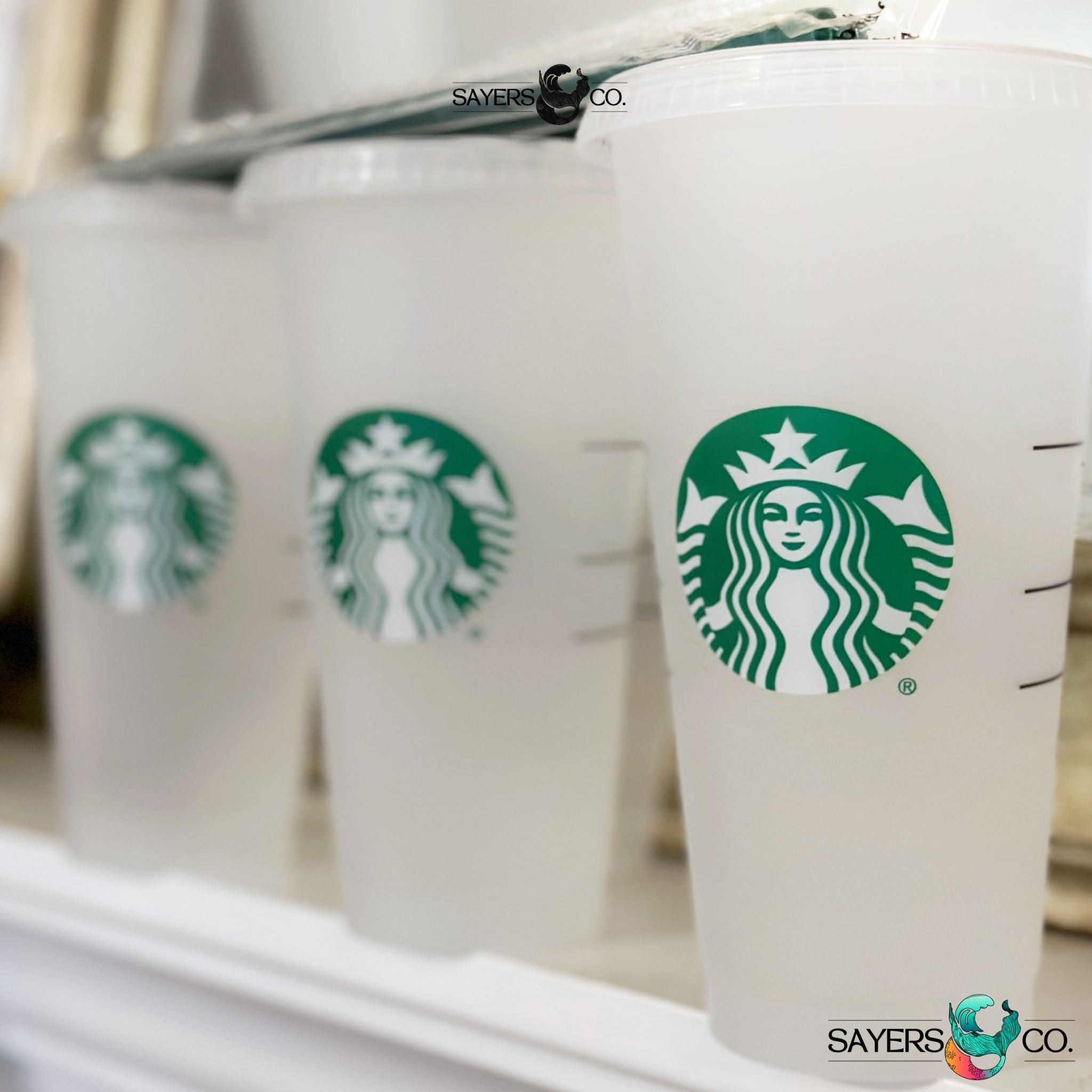 https://www.sayersandco.com/cdn/shop/products/Starbucks-Blank-24oz-Cold-Cups-Frosted-Custom.jpg?v=1693033566